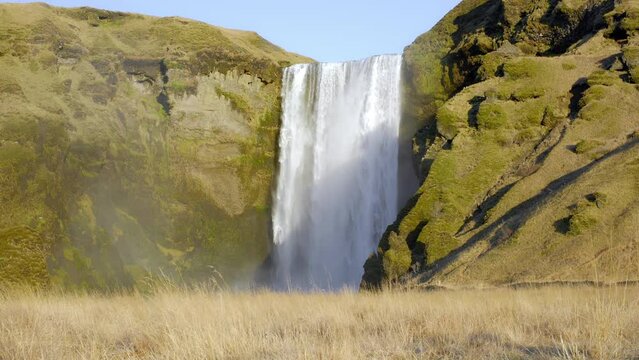 Skogafoss Famous Waterfall in Iceland, Autumn Season on Skoga River, Popular tourist attraction, Shot in 8K Resolution 4320p