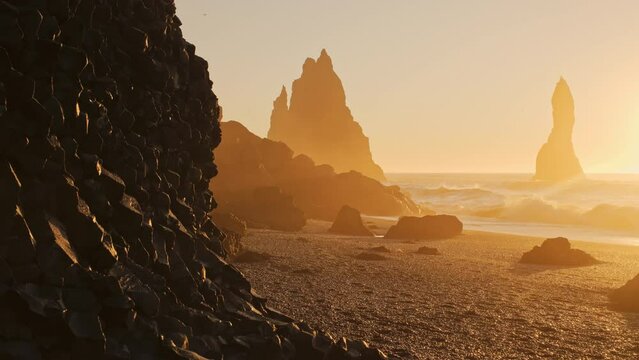 Famous Black Sand Beach In Iceland, Sunset over Volcanic Cliffside, North Atlantic Ocean Water, Vik, Shot in 8K Resolution 4320p