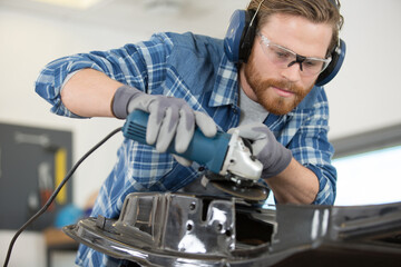a young man welder in