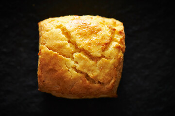 Plain scones on a black background