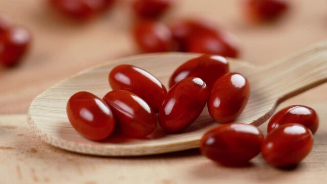 Brown supplement pills of alternative dietary herbal medicine with herb extracts and vitamins