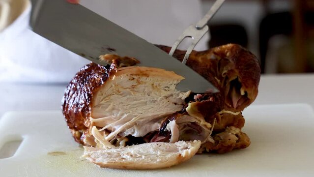 Slicing Meat off a Rotisserie Chicken