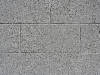 abstract gray background. city building wall made of concrete blocks