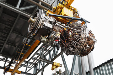 Perform a lift to install a new turbine engine for a power plant