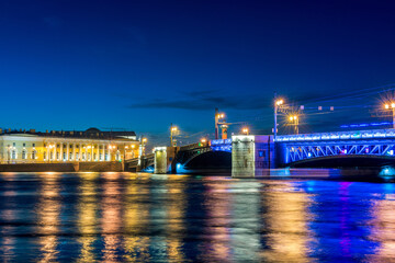 Night view of the palace bridge across the Neva in the city of St. Petersburg. Russia