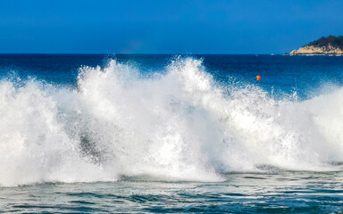 Extremely huge big surfer waves at beach Puerto Escondido Mexico.