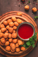 Chicken popcorn, deep fried, nuggets, close-up, rustic, no people,