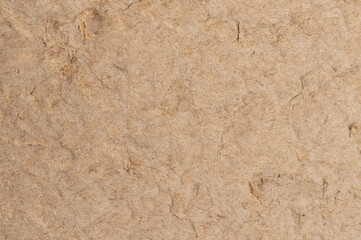 Cracked brown color plaster background