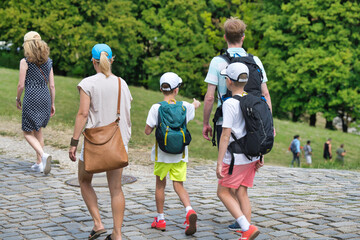 Fototapeta premium group of people walking in the park