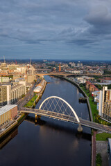 Fototapeta na wymiar Glasgow squinty bridge over the River Clyde, formally know as Arc Bridge