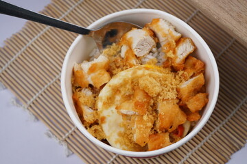 Asian food,  a bowl of rice with delicious meat crunchy and savory