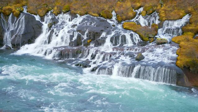 Beautiful Nature Waterfall in Iceland, Pure Turquoise Water in Mountain River, Shot in 8K Resolution 4320p