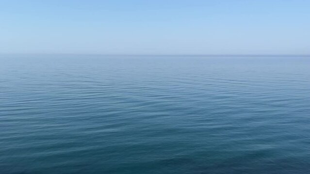 Blue sea water and sky.