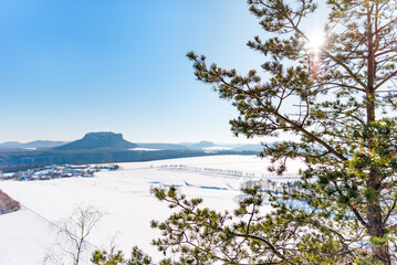 Fototapeta na wymiar Sunny winter landscape in Saxonian Switzerland
