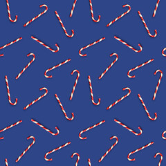 Seamless pattern with Christmas candies on bright blue background. Creative minimal X mas art. Copy space. Flat lay.