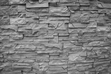 Texture of grey decorative tiles in form of brick. Background of grey bricks.