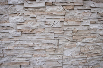 Texture of white and brown decorative tiles in form of brick. Background of white and brown bricks.