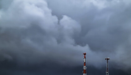 Rainy cloudy dark sky with telecommunication tower in Brazil