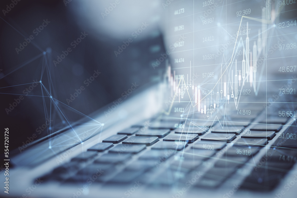 Aufkleber close up of laptop computer with glowing forex index chart/graph on blurry background. trade, financ