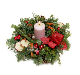 Christmas arrangement of freshly cut fir branches, decorated with Christmas balls and candles