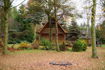 Fototapeta na wymiar House in the forest in autumn