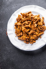 chanterelles mushrooms bio product fresh healthy meal food snack on the table copy space food background rustic top view keto or paleo diet veggie vegan or vegetarian food