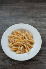 A bowl of penne pasta