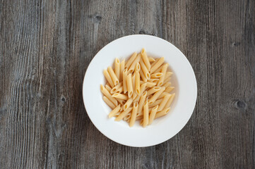 A bowl of penne pasta