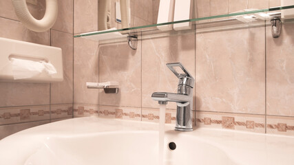 Interior bathroom with sink basin faucet, open chrome faucet washbasin. modern design of bathroom.