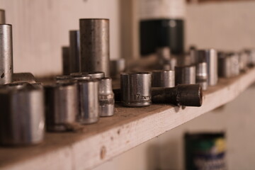 Vintage Tools Sockets on White Shelf