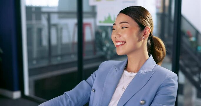 Asian woman, thinking and smile working on computer in business office, happy for success or corporate achievement. Japan, woman and employee happiness or done with creative planning on work desk pc