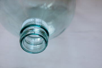 Empty huge glass bottle, copy space.