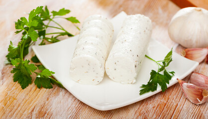 Image of goat cheese with herbs and garlic, french cuisine