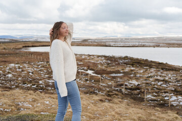 woman with a nice landscape of iceland
