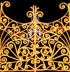 Bokeh christmas light gold brizled unfocused arabesques