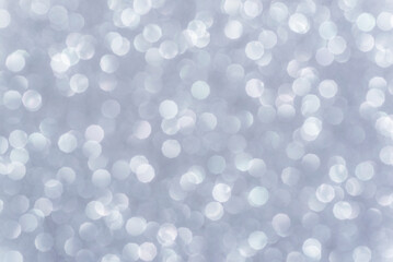 Silver abstract bokeh background, texture. Lights festive background concept