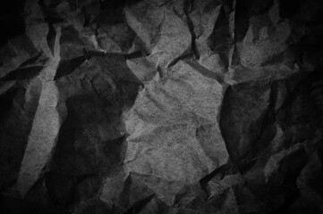 dark paper texture. minimalist and elegant crumple paper. simple dark background