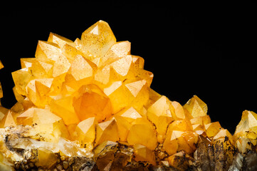 Citrine yellow quartz macro detail texture background. close-up raw rough unpolished semi-precious gemstone