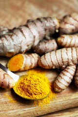 Turmeric. Turmeric root. Powder turmeric seasoning.