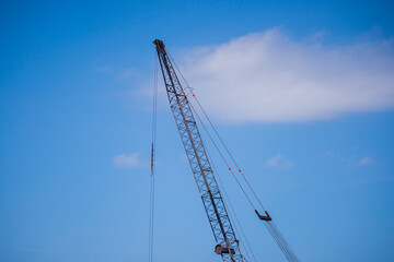Fototapeta na wymiar crane against blue sky