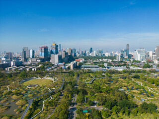 Aerial view city green forest public park with modern office building Benjakitti Park