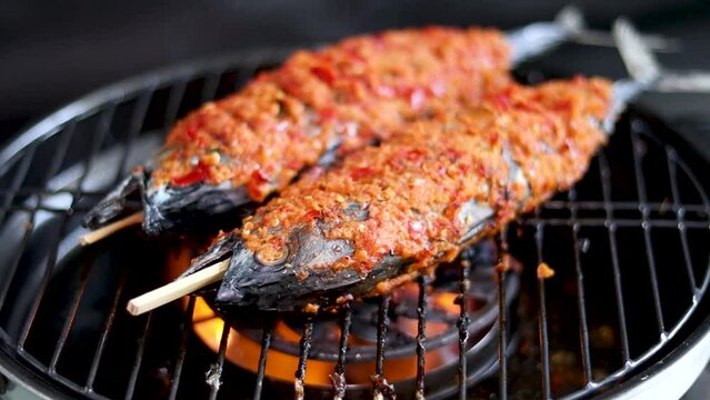Asian food. Grilled skipjack tuna with spicy spices is a typical seafood dish from East Java, Indonesia