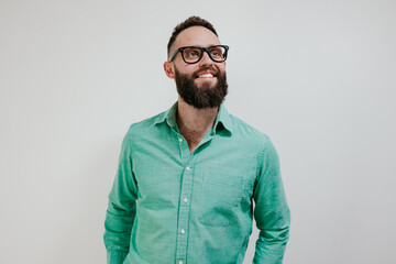 Obraz premium Young handsome caucasian male hipster isolated on white background. Eyeglass advertisement