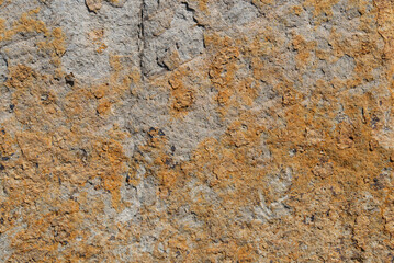 Gray volcanic rock background and brown texture.  of the rock eroded above  The rocky ground is...