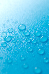  drops on a blue background with white gradient.Fluid texture in cold blue tones.Wallpaper blau phone.macro drops set.Water drops background.