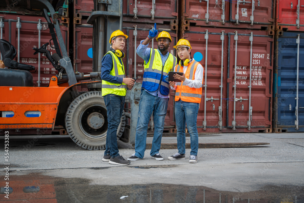 Poster Engineer container cargo with foreman working and checking stock into container for loading,Logistic and business export.