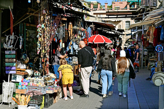 Israeli People Shopping  Shuk HaPishpeshim Jaffa Flea Market In Tel Aviv Israel