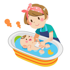 ベビーバスで赤ちゃんを洗う女性