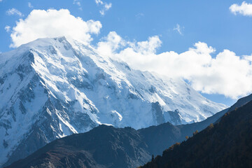 Fototapeta na wymiar Nanga Parbat is the ninth highest mountain in the world and western anchor of the Himalayas. Located in Pakistan, it is one of the 14 eight-thousanders, with a summit elevation of 8126 m.