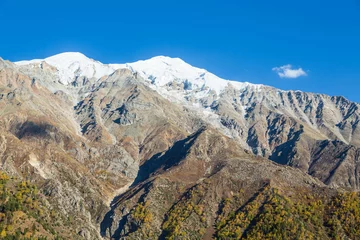 Papier Peint photo Nanga Parbat Mountain range next to Nanga Parbat mountain peak from Fairy Meadow. Gilgit, Pakistan